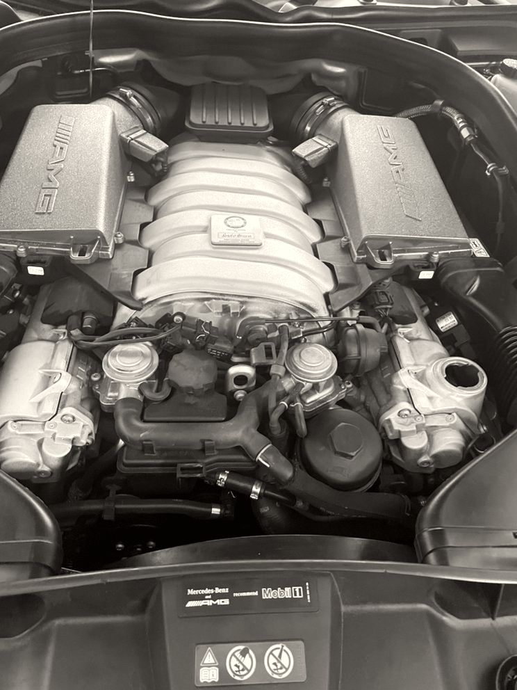 An AMG V8 engine bay under service